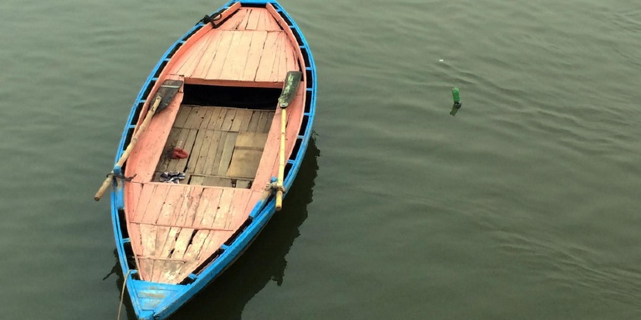 Row boat on still water