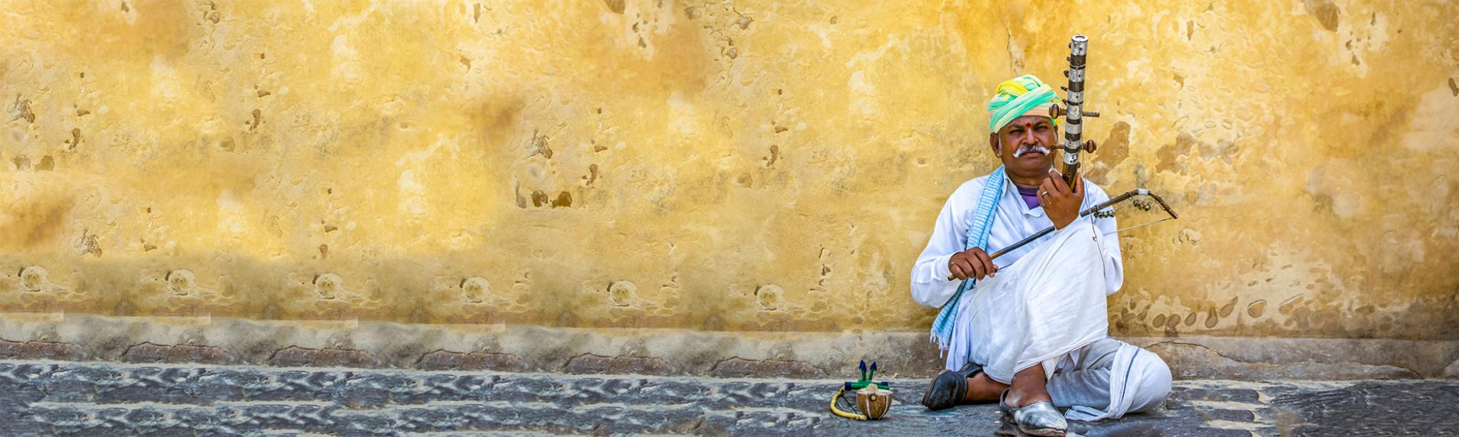 Man playing string instrument